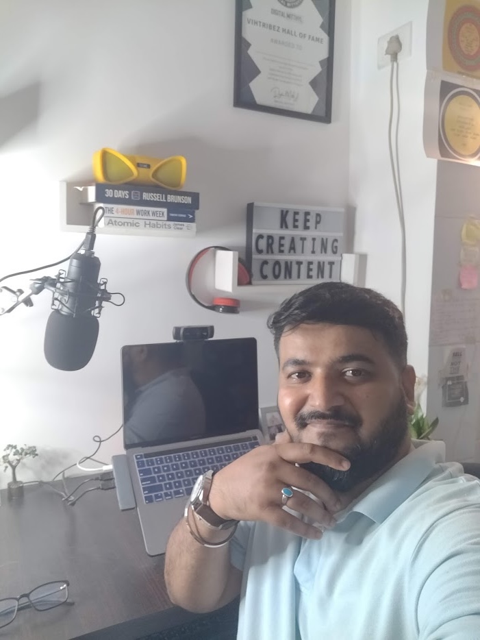 Mithyll Dave recording an episode of The Content Alchemist Show at a studio microphone